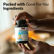 Hand holding a bottle of 'Amazing Ashwa' supplement with text 'Packed with Good-For-You Ingredients'.