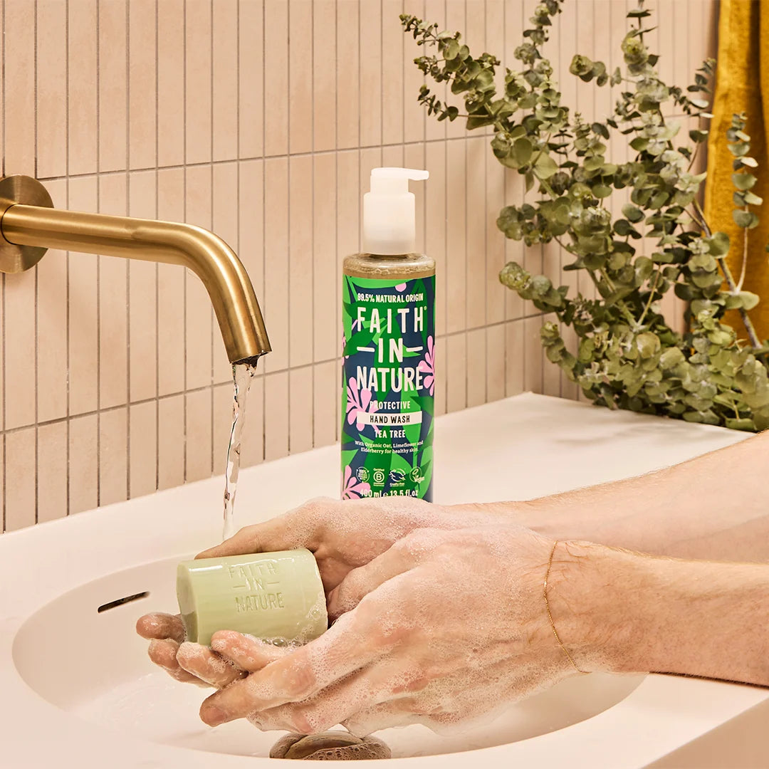 Faith In Nature Tea Tree Vegan Bar Soap 6 × 100g cardboard packaging in hand washing use