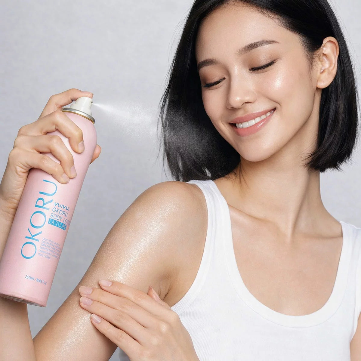 How to Use Image: Okoru body lotion spray La Tulipe 250ml applying mist on skin