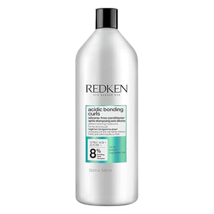 Redken Acidic Bonding Curls Concentrate Conditioner bottle, 1000ml, on white background.