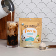 Four Sigmatic creamer to a refreshing glass.