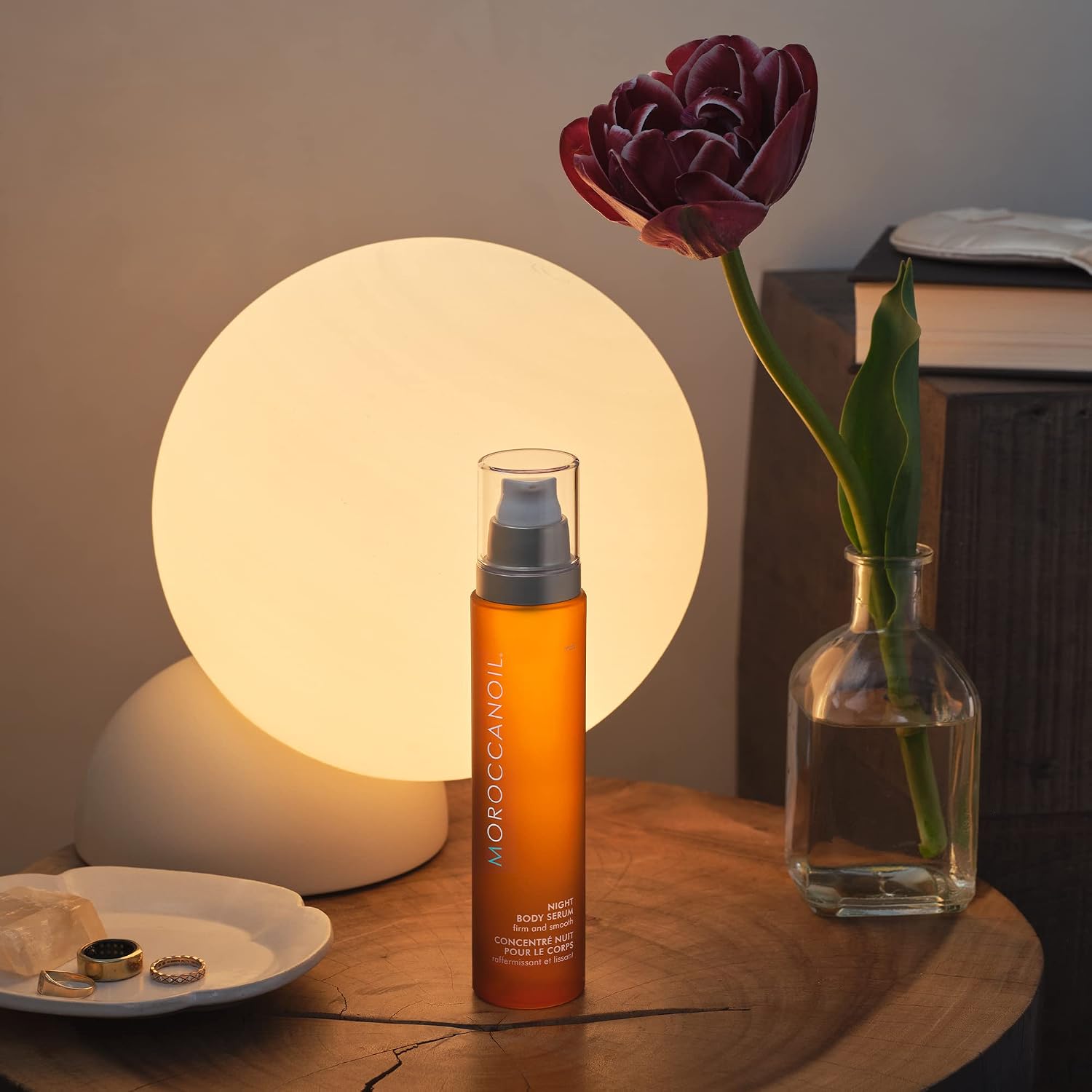 Moroccanoil Night Body Serum, pump bottle packaging, fragranced formula, 100ml, evening body skincare use