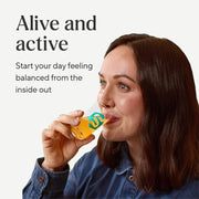 Symprove Liquid Probiotic Pineapple Flavour 500ml probiotic drink lifestyle woman drinking
