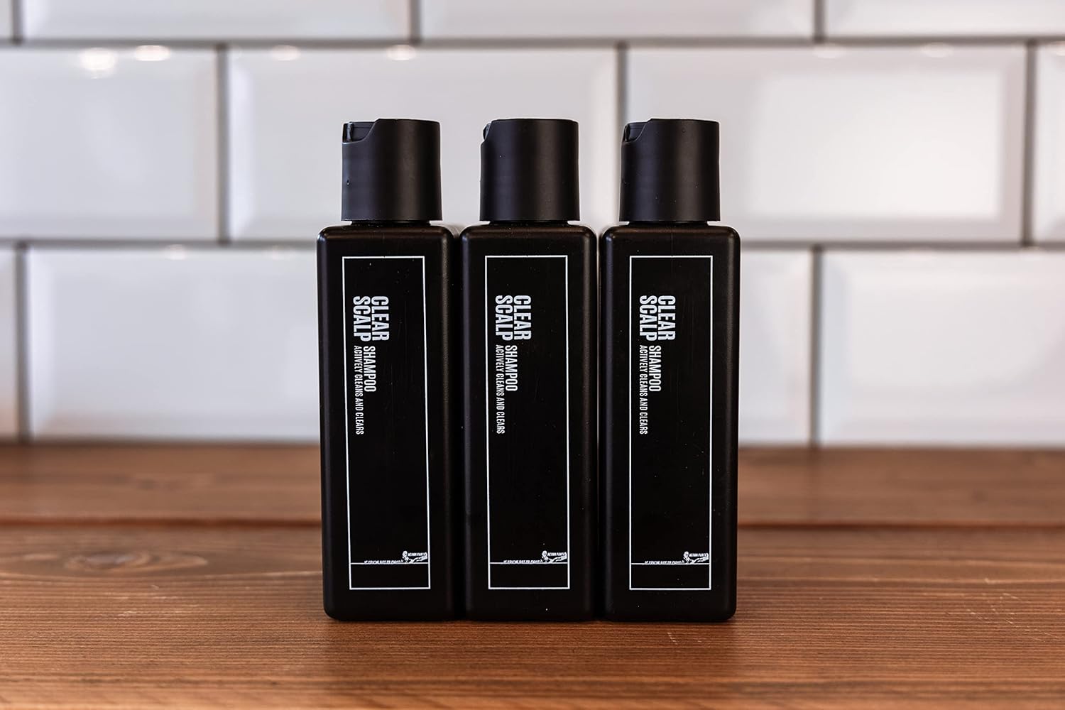 Lifestyle/use image: Uppercut Deluxe Clear Scalp Shampoo 3 240ml men hair care routine