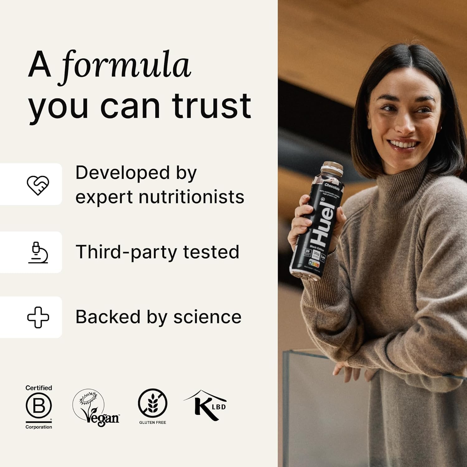 Huel Black Edition Ready-to-Drink Strawberry Banana plant based meal drink bottle lifestyle use image 500ml 8 pack