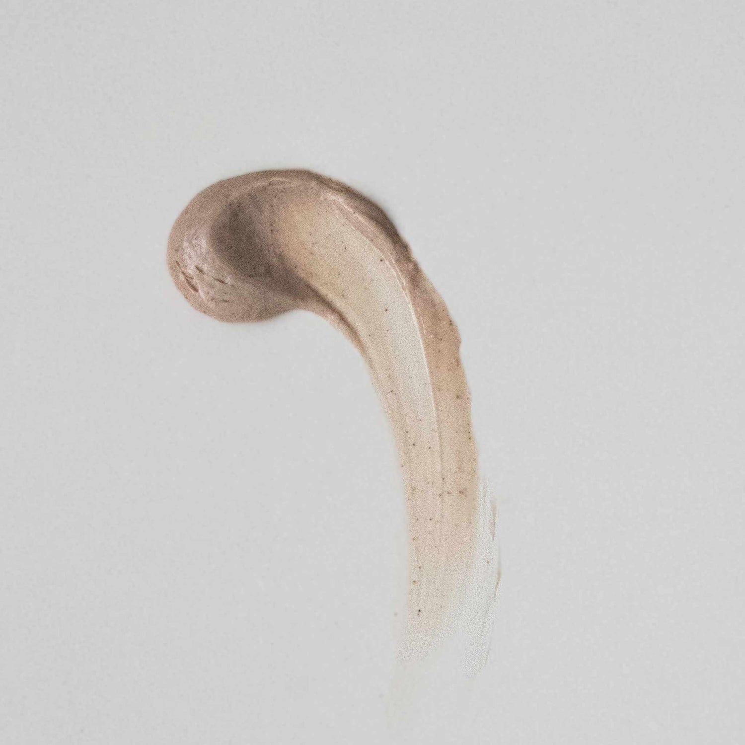 Wooden spoon on a light gray background