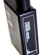 Side image: Uppercut Deluxe Strength and Restore Conditioner 240ml bottle mandarin patchouli fragrance packaging