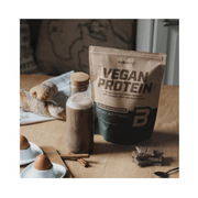 Lifestyle/use image: BioTechUSA Vegan Protein chocolate cinnamon plant protein powder 2kg