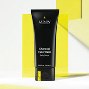 Lumin Charcoal Face Wash for Men, 100mL tube, on white & yellow background.